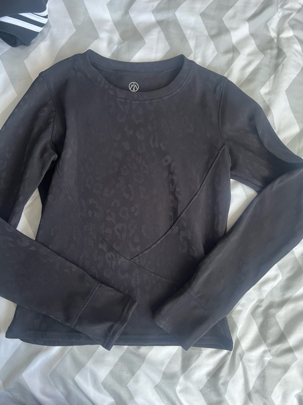 Women’s black long sleeve athletic top